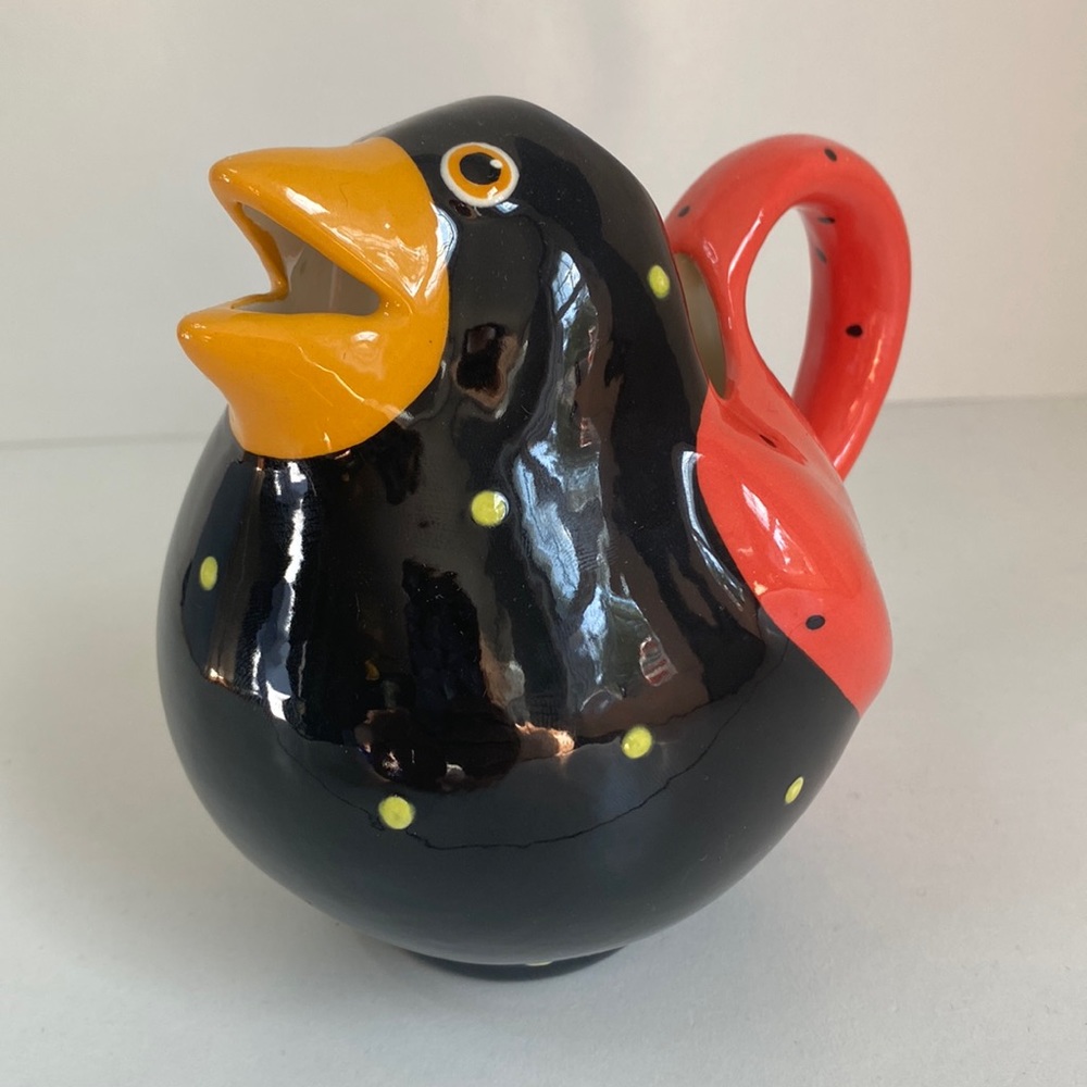 Alison Palmer bird chick creamer orange black